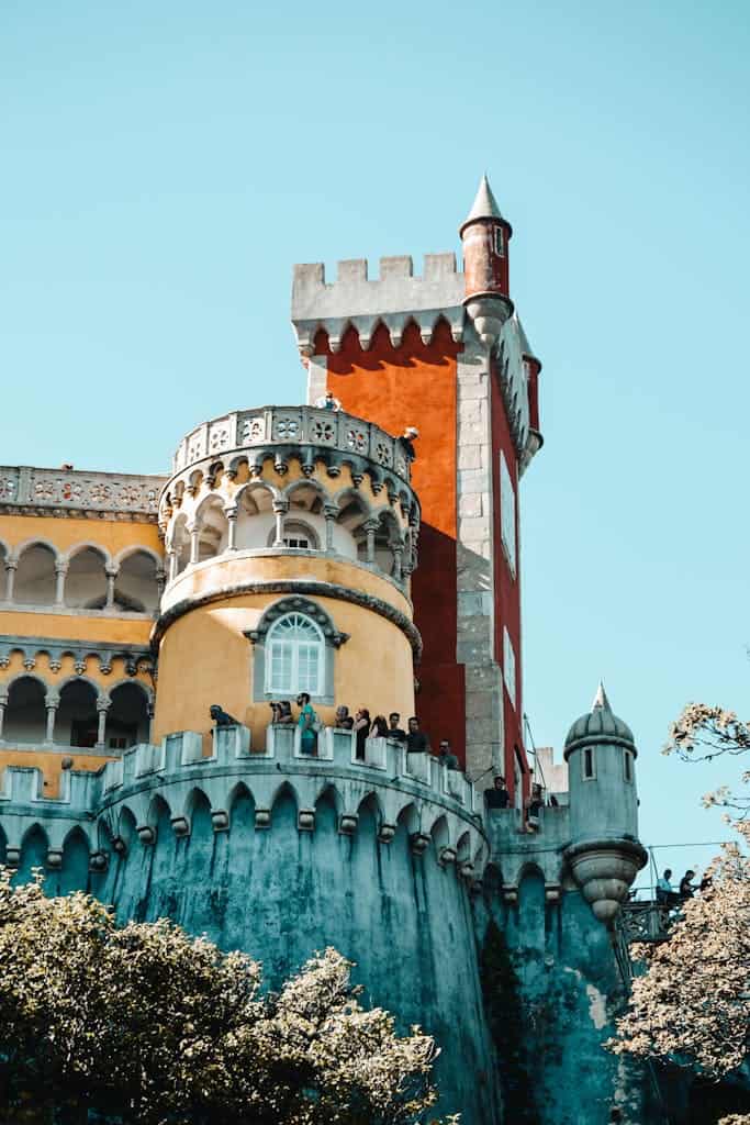 Explore the vibrant architecture of Pena Palace in Sintra, a UNESCO World Heritage Site.