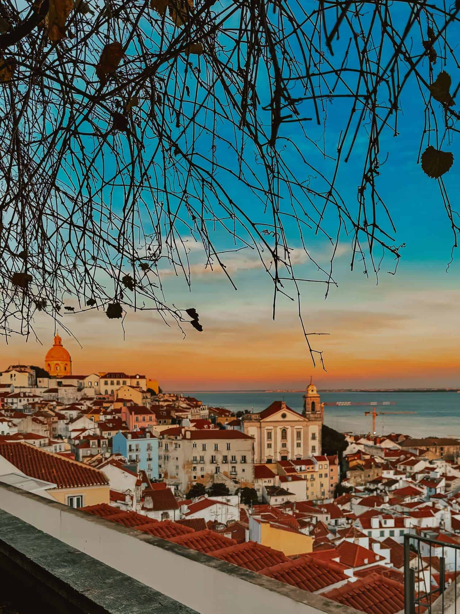 Beautiful view from Miradoura Santa Luzia in Lisbon Portugal - a must add to any 1 day Lisbon itinerary