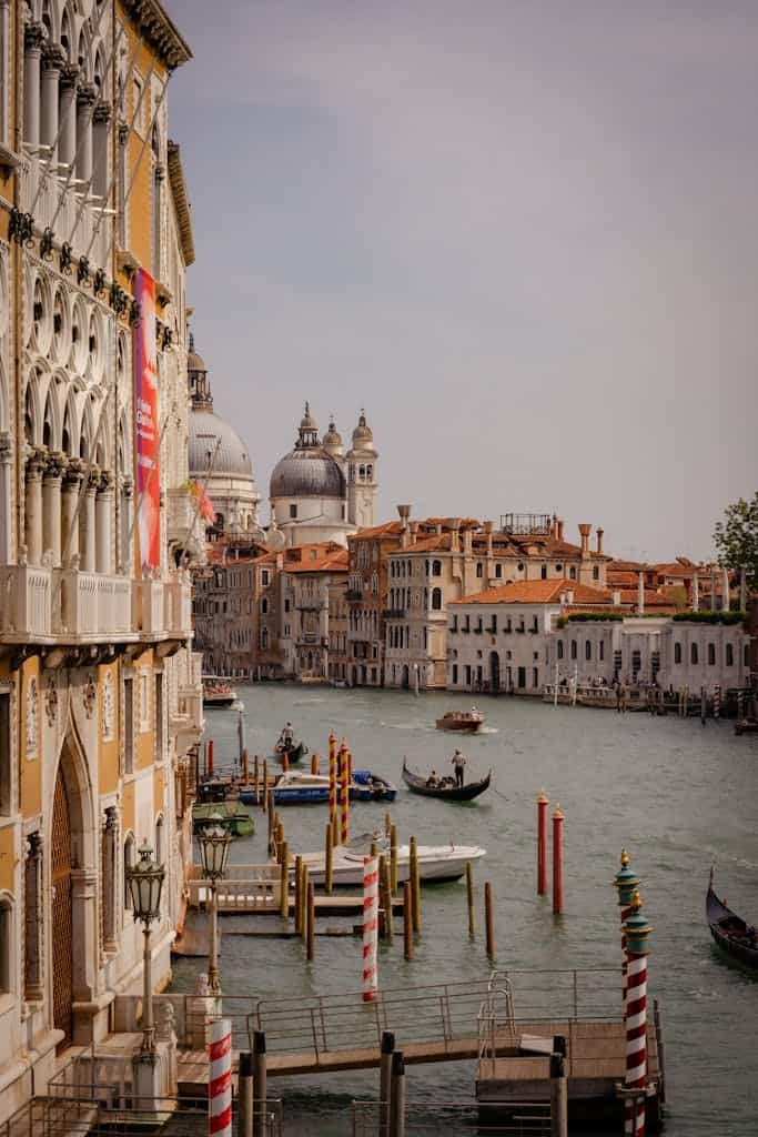 Scenic Venice Grand Canal with gondolas and historic buildings. Ideal for travel imagery.