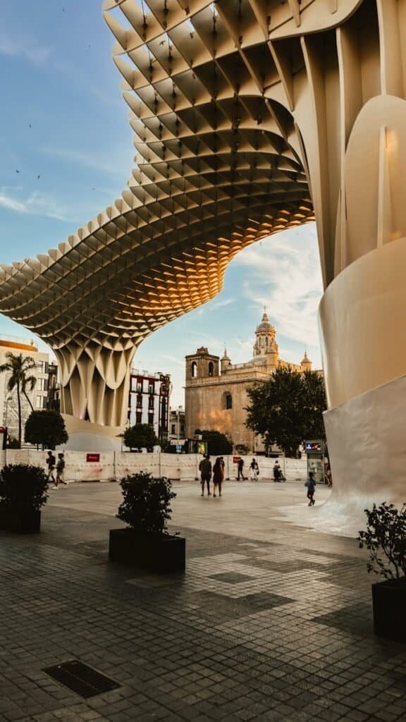 A beautiful arched walked away under Las Setas in Seville Spain